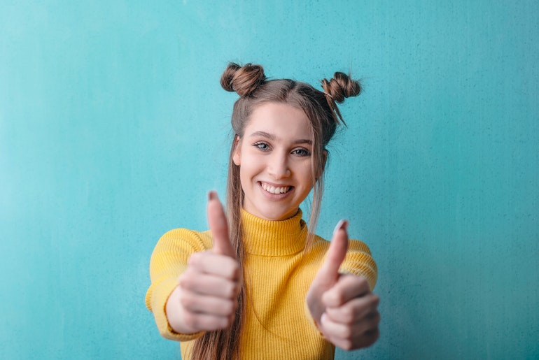 Woman Giving Thumbs Up