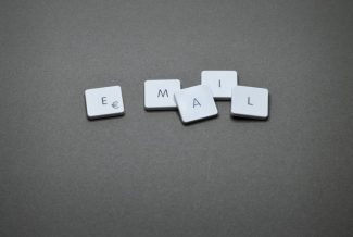 Scrabble tiles spelling out email
