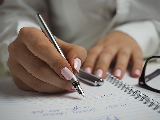 Woman Writing With Fountain Pen