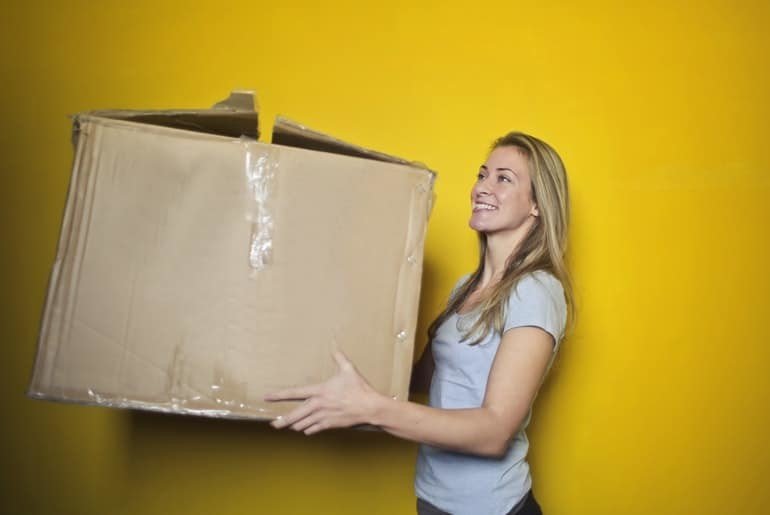 Woman holding storage box