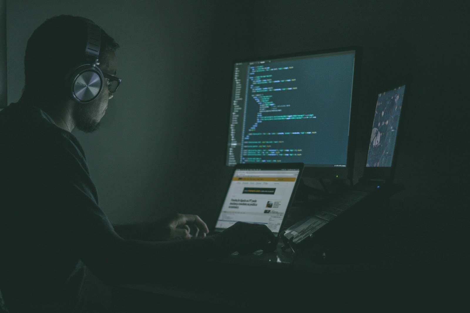 Man in front of computer screen