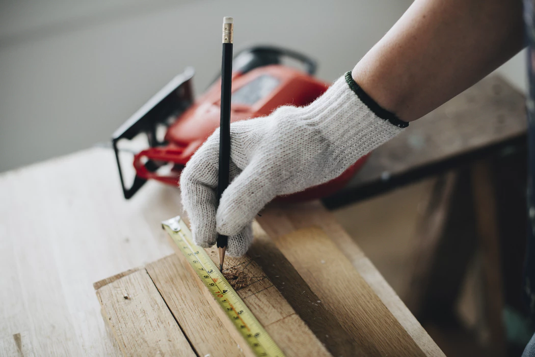 Marking out wood with ruler