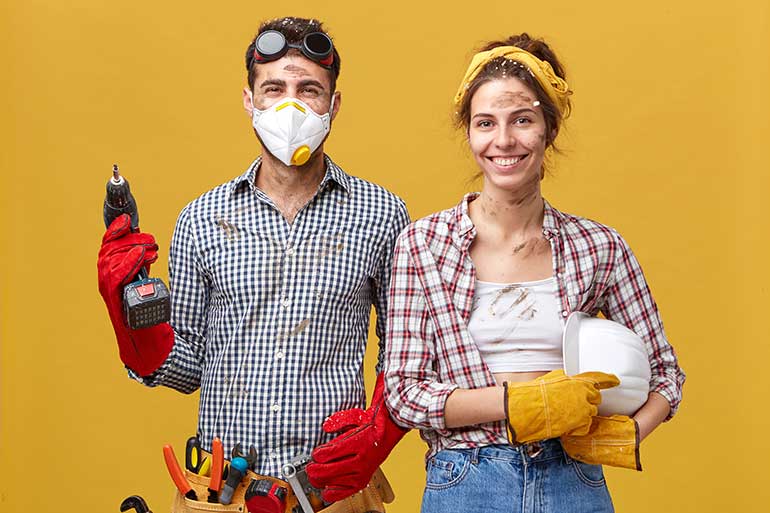 Man and woman dressed for DIY