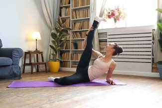 Person praticing yoga at home