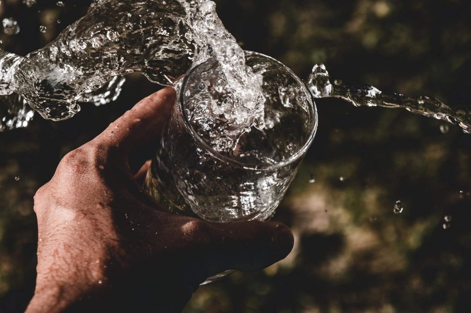 Water splashing out of a glass