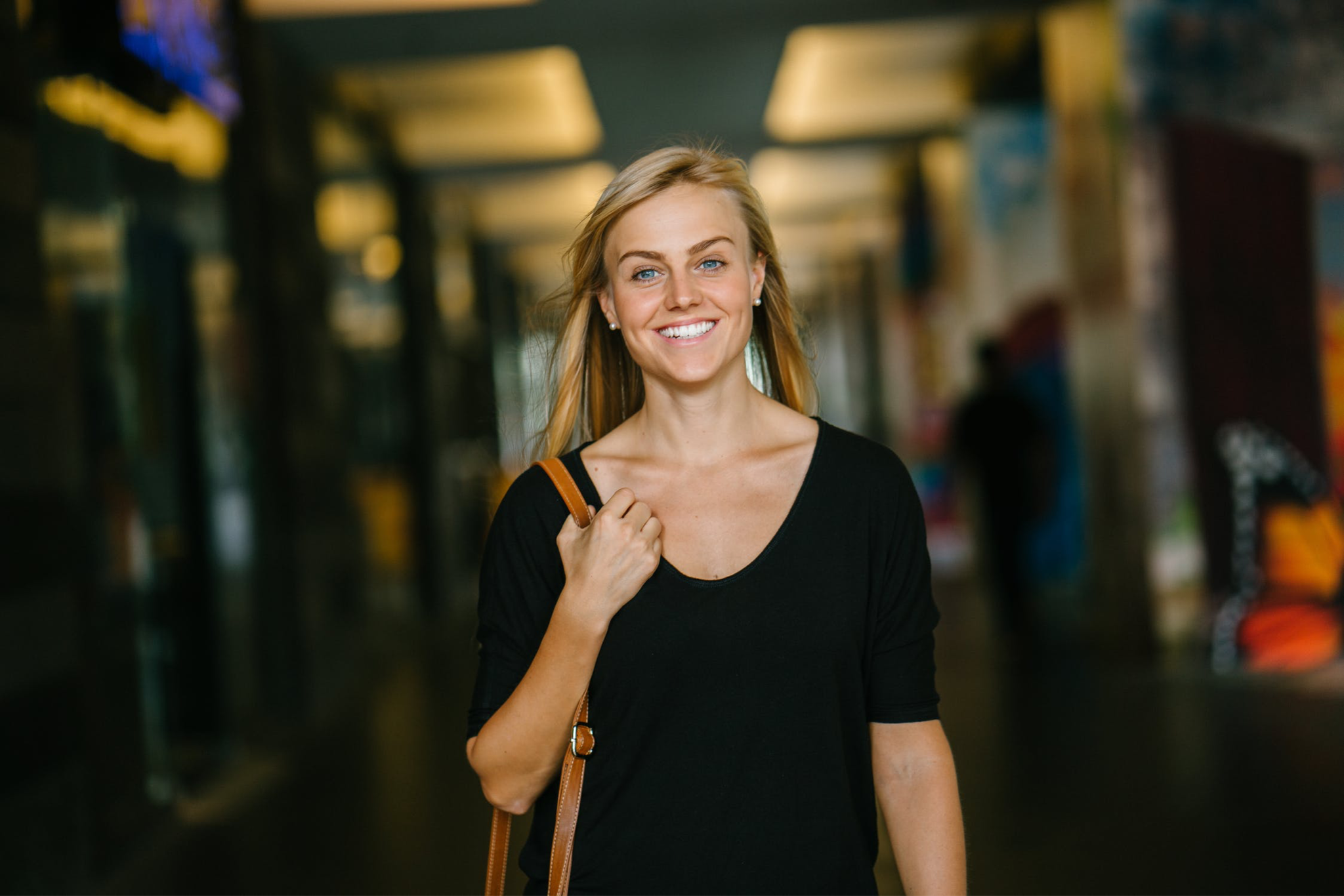 Smiling woman in a shopping mall