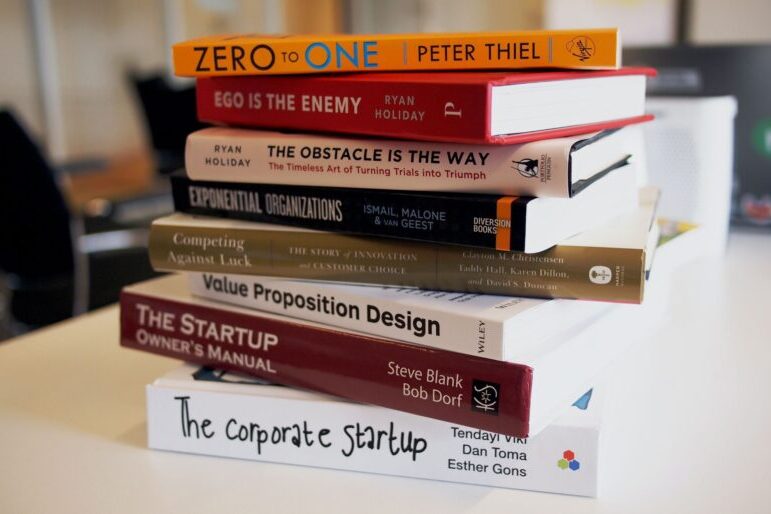 Pile of self-help and entrepreneurial books