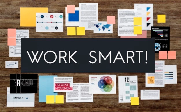 The words "Work Smart" surrounded by various documents