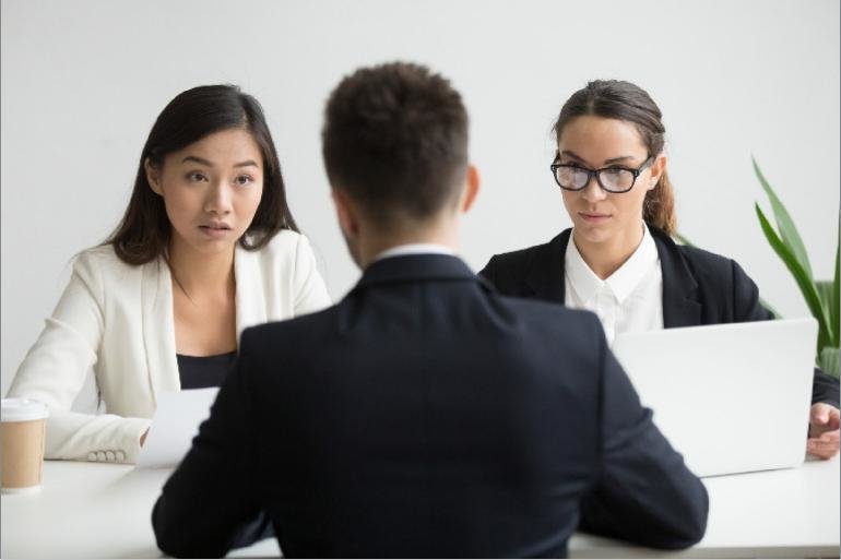 Two women interviewing conducting a job interview