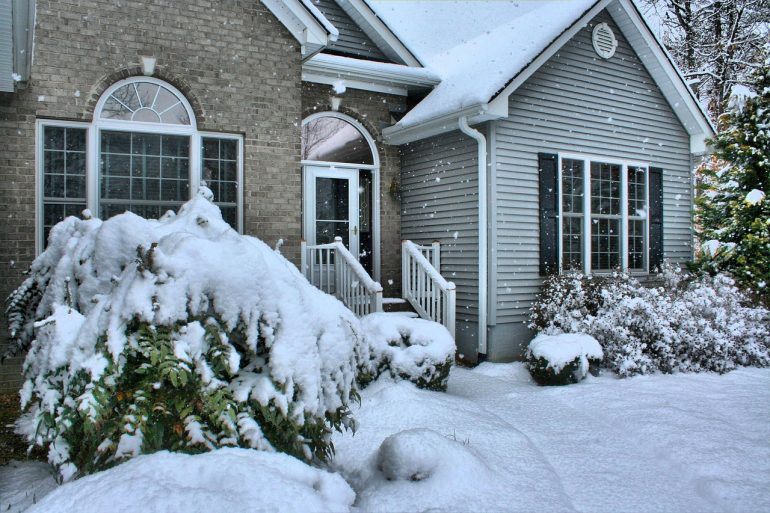 Exterior of a house with snow outside