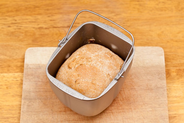 Cooked bread in a bread making tin