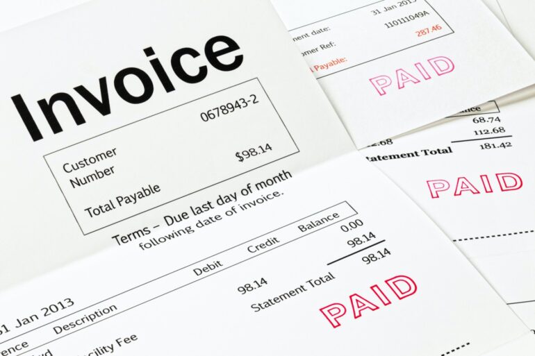 Image of various invoices showing that they are paid