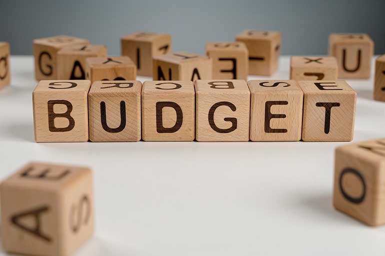 The word "Budget" printed on wooden blocks