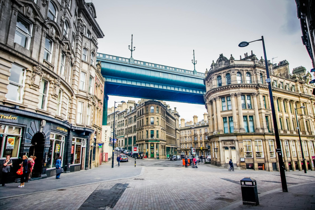 A London street showing old buildings and a walkway between them